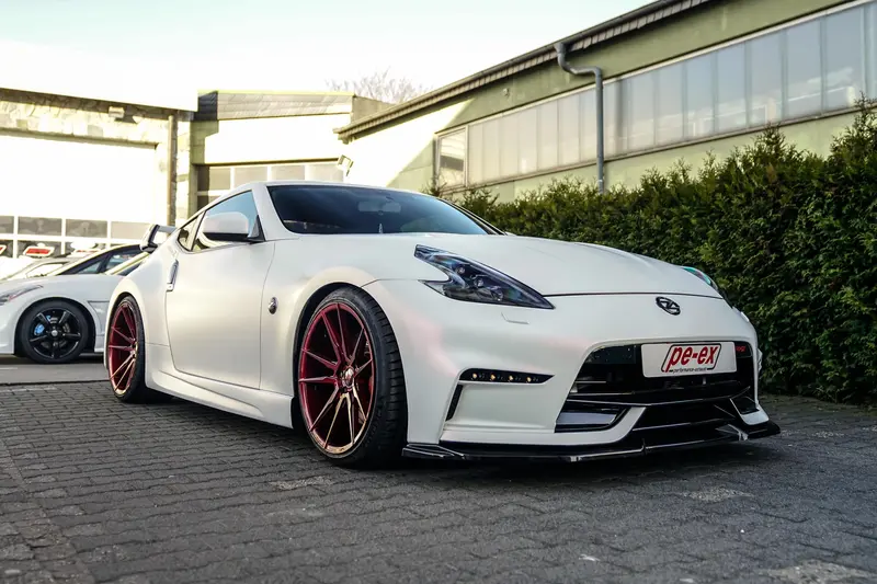 Nissan 370Z Coupé 2nd hand Appraisal grade 1- Extensive investments Amuse rear spoiler KW V3 suspension Stillen Coolair Intake Japan Racing rims Complete checkbook (2014)