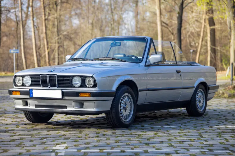 1991 BMW 318iA Convertible (E30), owned for 29 years, with service records, H license plate, and extensive documentation