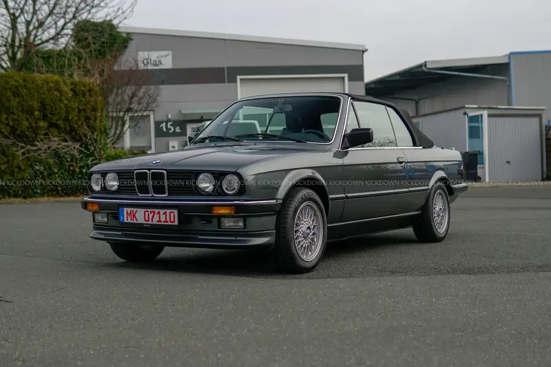 BMW 320i Convertible E30 (1987) with like-new soft top, elegant color combination, H license plate, family-owned for 29 years