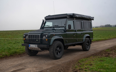 Land Rover Defender 110 TD4 (2008) with motorhome registration, map optimization to 162 hp, high-quality expedition and camper conversion