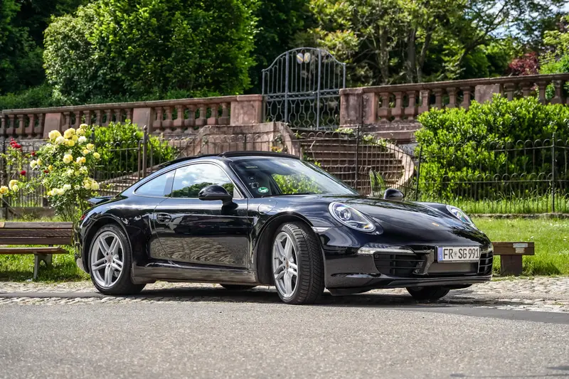 Porsche 911 991 Carrera (2014) in black, Well-maintained condition, Porsche Approved Warranty, With expert opinion