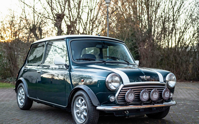 Rover Mini Cooper 1.3 history checkbook from collection (1999)