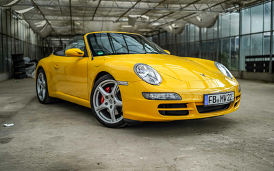 Porsche 997 Carrera S Cabriolet in speed yellow, only 40,000 km, 6-cylinder boxer engine with 355 hp (2006)