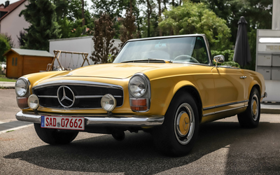Mercedes Benz W113 230 SL Pagoda in yellow partially restored Sonnenland roof (1966)