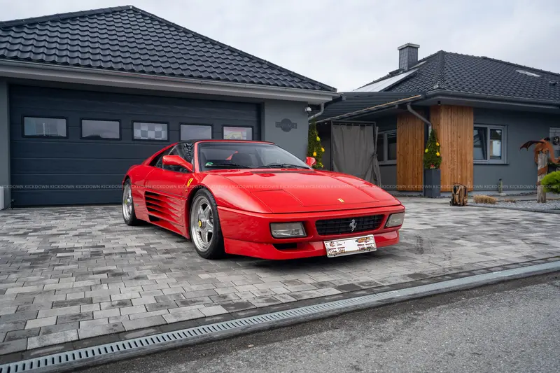 Ferrari 348 TS (1992) in classic red, with a grade of 2 on the inspection report, in very good overall condition