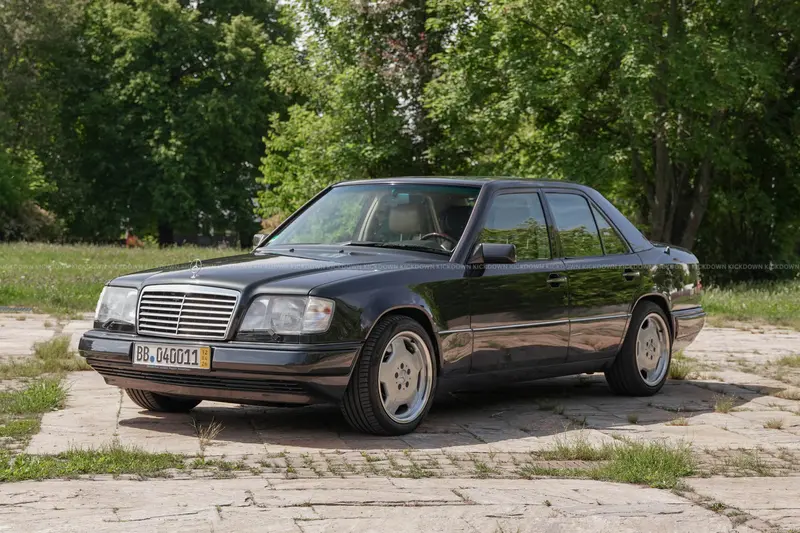 1994 Mercedes-Benz E420 W124 with a GTÜ brief inspection report (grade 3+), extensive features, and an H license plate