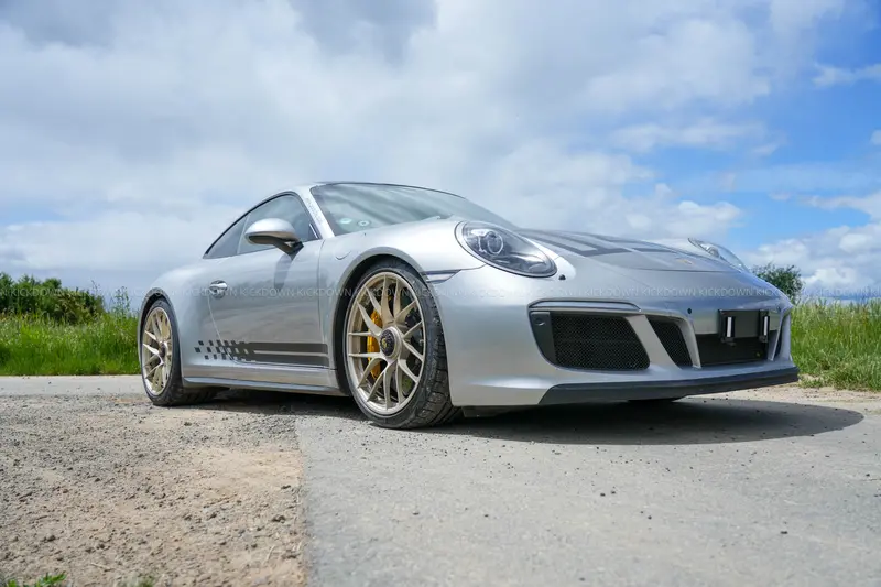 Porsche 911 991.2 GTS (2018), registered through June 2027, carbon-fiber bucket seats and ceramic brakes, complete service history