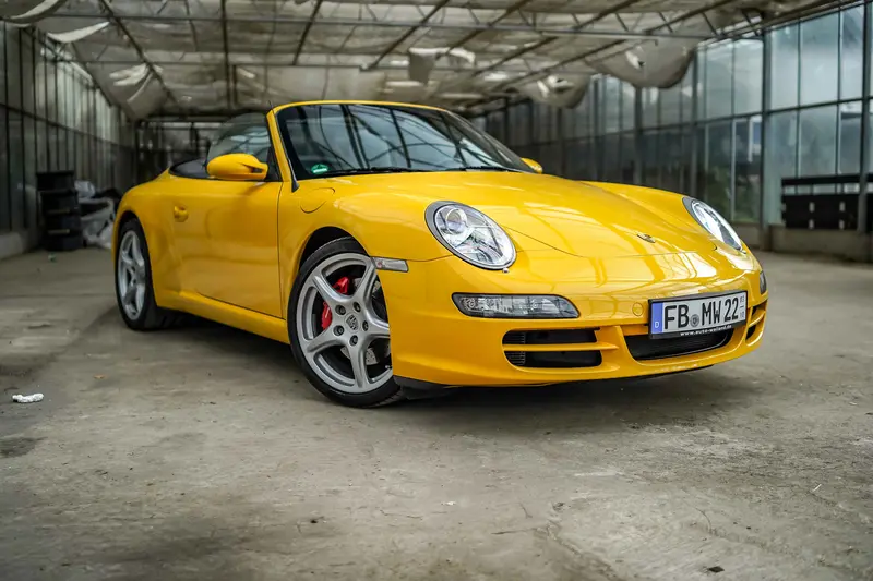 Porsche 997 Carrera S Cabriolet in speed yellow, only 40,000 km, 6-cylinder boxer engine with 355 hp (2006)