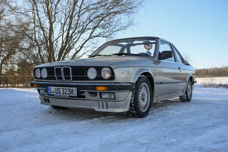 BMW 323i Baur Cabriolet E30 (1984), second-hand, six-cylinder with full service history, H license plate, and grade 2 certification.