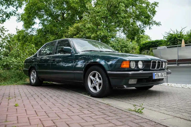 BMW E32 735i (1992) in metallic green, engine rebuilt, brake system and exhaust renewed