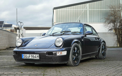 Porsche 911 964 Carrera 4 Coupé Rubinschwarz Klima CDR-22 Radio 5-Gang Schalter (1990)